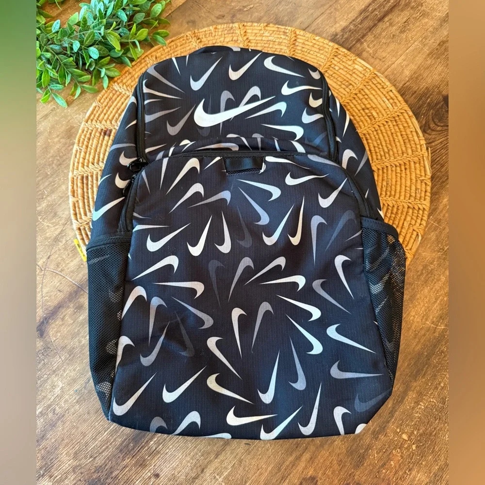 Nike Black and Gray Swoosh Logo Pattern Backpack